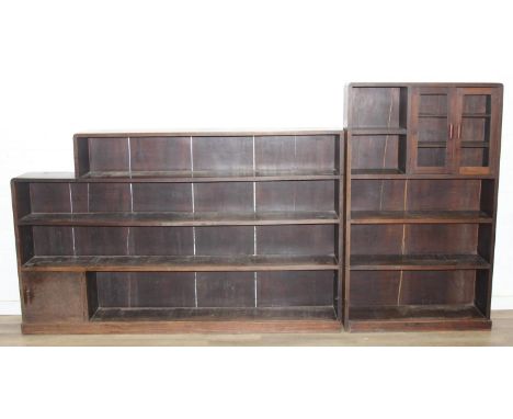 A large two-piece bookcase or display shelves with glazed cupboard, early-mid 20th century, 296cm x 27cm x 156cm