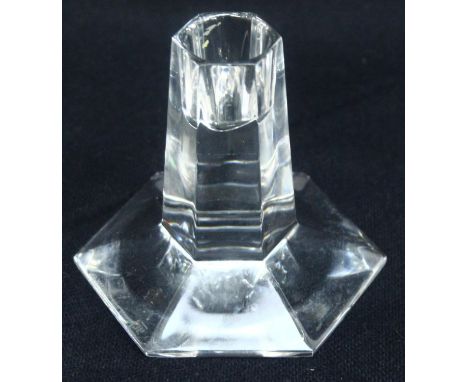 A Tiffany &amp; Co glass single candlestick designed by Frank Lloyd Wright, various marks to base, 1980's, 10cm tall