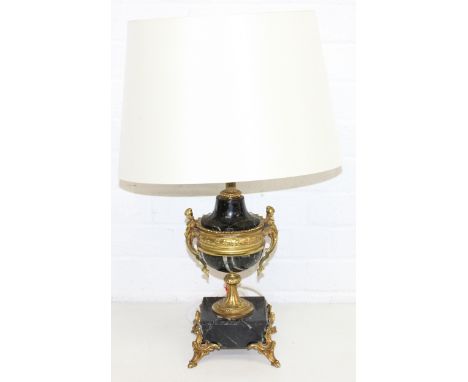 A vintage Neoclassical style black marble urn-shaped lamp with shade and gilt metal or ormalu supports and figurative decorat