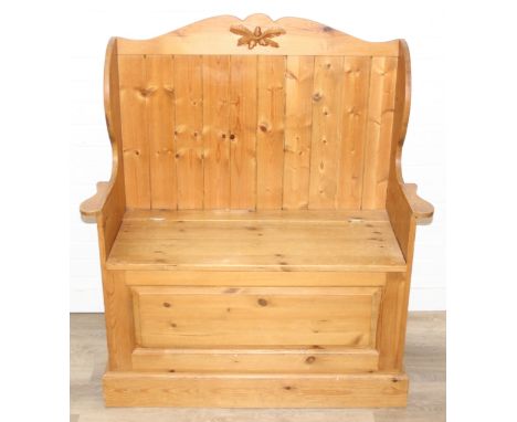 A vintage pine settle or hall seat with storage box seat, carved details, 91cm x 43cm x 109cm