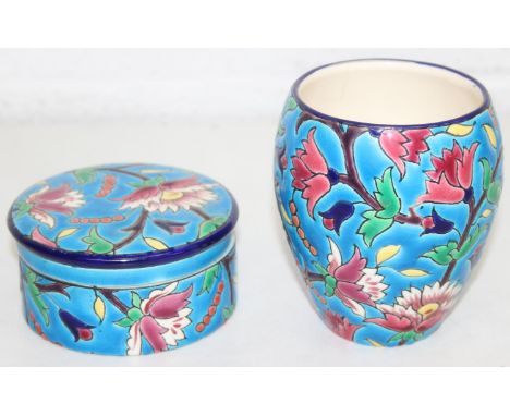 Two pieces of French Longwy pottery to inc a vase and a lidded pot, classic colourful enamels depicting flowers on turquoise 