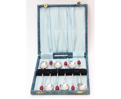 A boxed set of six coffee bean end spoons, slightly unusual facet cut bowl and a red Bakelite bean to the end, marked for Bir