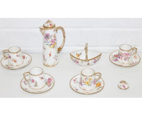 G. Demartine &amp; Cie of Limoges, a floral decorated small coffee set with four cups, four side plates, a small coffee pot a