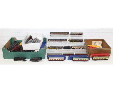 Four boxes of assorted model train and railway items to include rolling stock, Locomotives etc, mainly OO gauge, a small box 