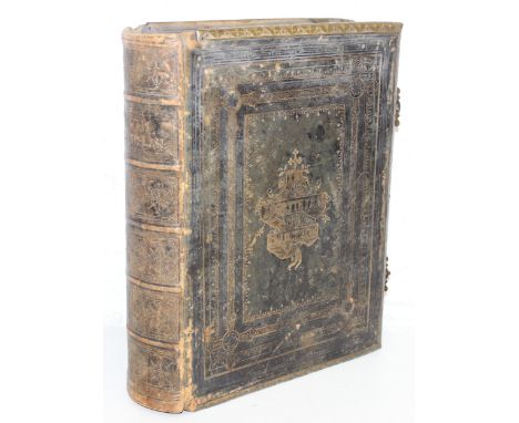 A large antique Welsh language bible, leather-bound with brass edges and clasps 'Y Bibl Cysegr-Lan' Welsh Bible, 34cm x 28cm