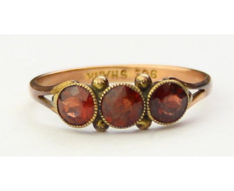 [1.45g, P] - a vintage 9ct gold and three stone Garnet dress ring, marked 9ct shank and XRF confirmed