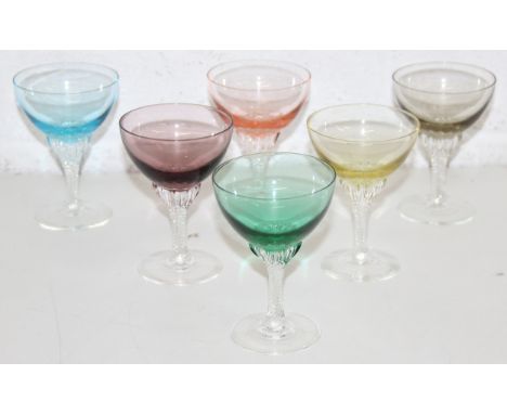 A set of 6 antique or vintage small wine or champagne coupe glasses in harlequin colours, coloured bowls with twisted stems, 