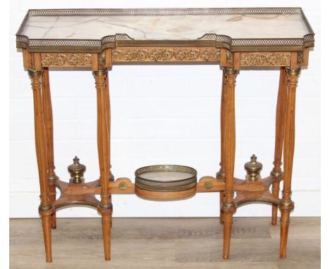 A French Louis XVI console or side table with white marble top within raised and pierced brass gallery, slender reeded column