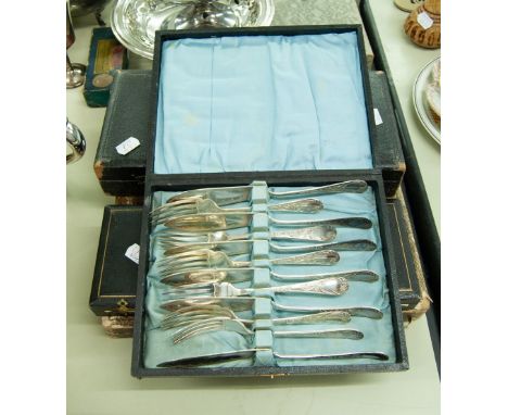 A CASED PAIR OF ELECTROPLATED BONE HANDLED FISH SERVERS, also a  CASED SET OF SIX FLORAL EMBOSSED FISH KNIVES AND FORKS and a