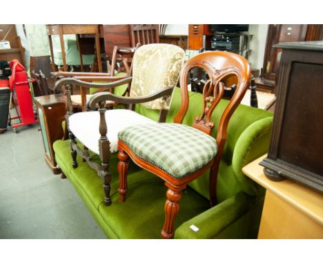 AN OAK OPEN ARMCHAIR WITH PADDED SEAT AND BACK, A COMMODE ARMCHAIR AND A DINING CHAIR (3) 