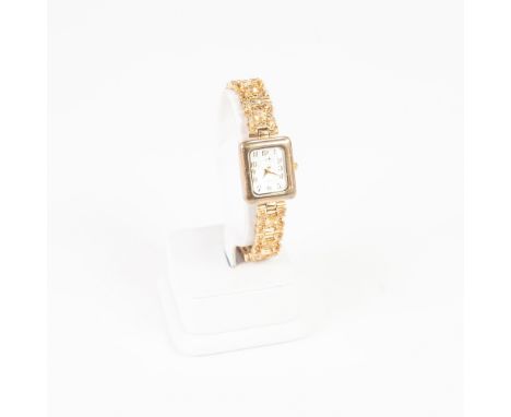 LADY'S QUARTZ COCKTAIL WRIST WATCH  with oblong mother o'pearl Arabic dial, the gilt case and integral fancy bracelet marked 