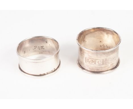 TWO SILVER NAPKIN RINGS, an odd silver  TEA OR JAM SPOON, a silver souvenir SPOON and a pair of  SILVER SUGAR TONGS  2oz all 