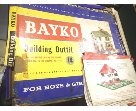 Four boxes of Bayko parts, bases, roof sections, windows, build books etc. All require cleaning. P&amp;P Group 3 (£25+VAT for