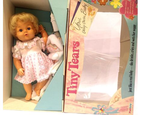 Palitoy Tiny Toys dolls. Cries, drinks and wets herself. Boxed as new with bottle, dummy etc. Box in very good condition. P&a