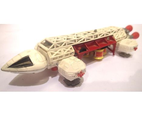 Dinky Toys Eagle Freighter, red and white version. Complete with minor chips and rubs, release mechanism working, all spring 