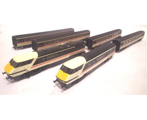 Hornby Class 91, 91014, Intercity Swallow Livery with four coaches and DVT. P&P Group 2 (£18+VAT for the first lot and £3+VAT