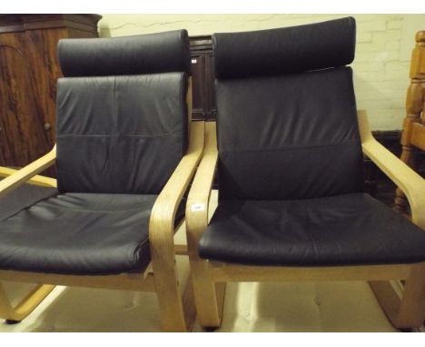 A Pair of Modern Ikea Armchairs and a Foot Stool