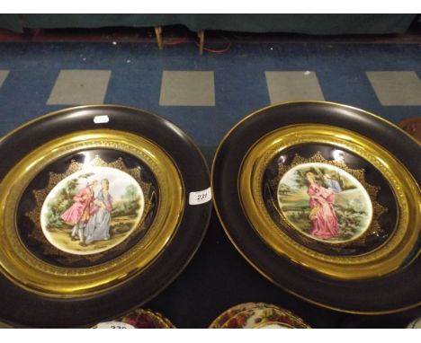 A Pair of Regency Ceramic Plaques Set in Metal Frames