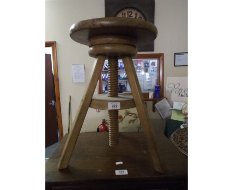 A Swivel Top Adjustable Three Legged Stool 