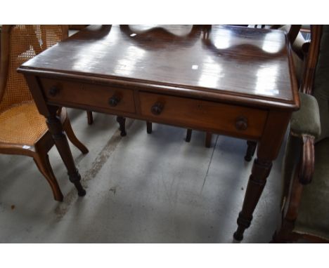 A 19th Century mahogany side table having double frieze drawer on turned legs, width approx. 92cm, bit of wear and light scra