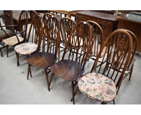 A set of five (four plus one) hoop and stick back kitchen chairs, labelled Ercol