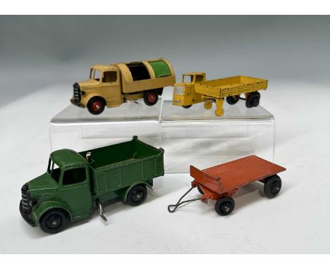 Dinky Toys Bedford LD Truck 411, apple green with black chassis and radiator grille, winding action tipping flatbed; Dinky To