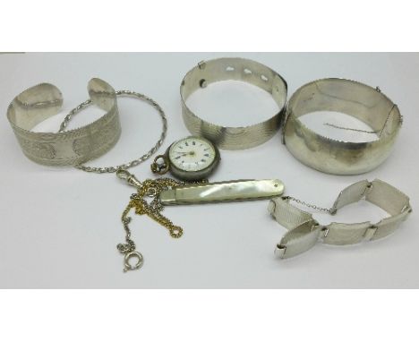 Three silver bangles, a gun metal fob watch, a silver and mother of pearl pen knife, etc., weight of silver 97g