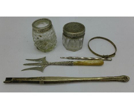 A Victorian silver and mother of pearl fork, a silver dip pen, a pencil, etc.