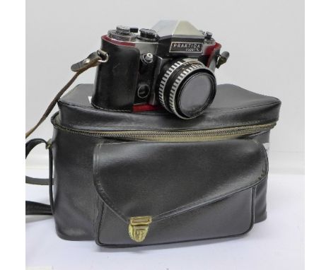 A Praktika Super TL SLR camera with case