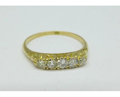 An 18ct gold, five stone diamond ring, 2.5g, S