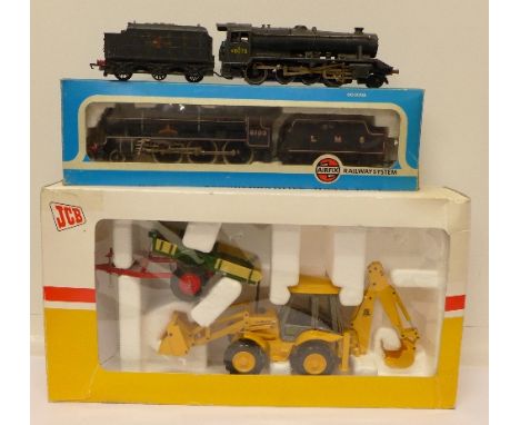 An Airfix OO scale LMS Royal Scots Fusilier Train, boxed, a 2-8-0 steam locomotive and a JCB commemorative model pack, boxed