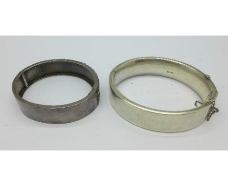 A Victorian silver bangle, Birmingham 1889 and another silver bangle, 68.6g