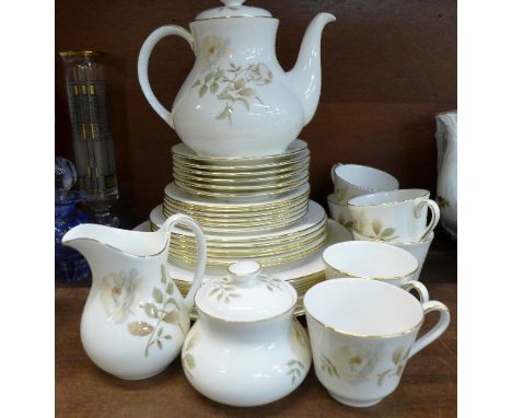 A Royal Worcester Yorkshire Rose six setting tea and dinner service