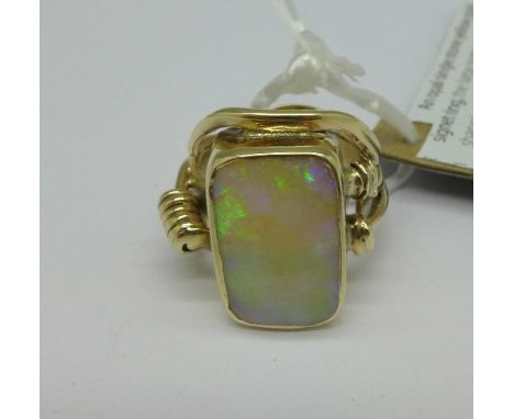 A 9ct gold, Australian opal set ring, opal 17mm x 11mm, mark worn, 10g, N