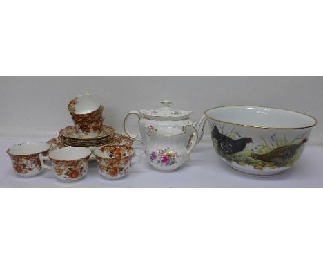 A Franklin Porcelain Game Bird bowl, a Royal Crown Derby Derby Posies teapot, cream jug and Longton Wellington china part tea