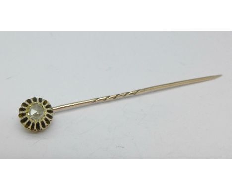 A yellow metal set old cut diamond stick pin