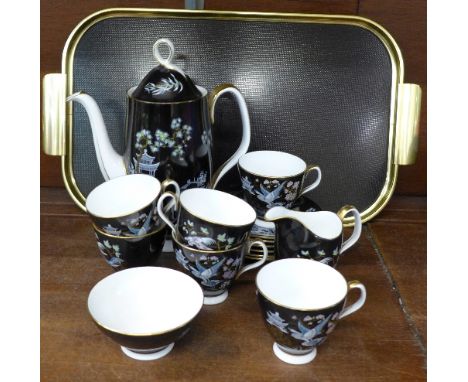 A Royal Albert Oriental six setting teaset with cream and sugar and a 1960's black and gilt tray