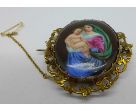 A hand painted miniature portrait brooch