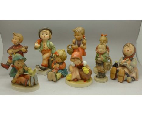Nine Goebel Hummel figures, six a/f