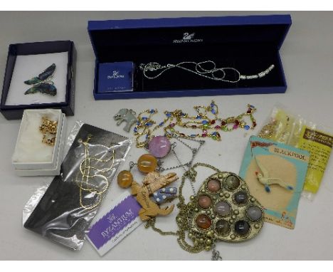 Costume jewellery including a Swarovski necklace, gold plated necklace, bracelet, chain and pendant, etc.