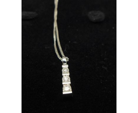A 9ct white gold and diamond pendant and chain, 0.25ct diamond weight, chain 45cm, 1.8g