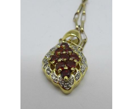 A 9ct gold chain with pendant