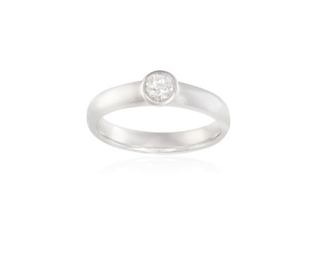 A DIAMOND SINGLE-STONE RING, the round brilliant-cut diamond within collet-setting, to a plain 18K white gold hoop, ring size