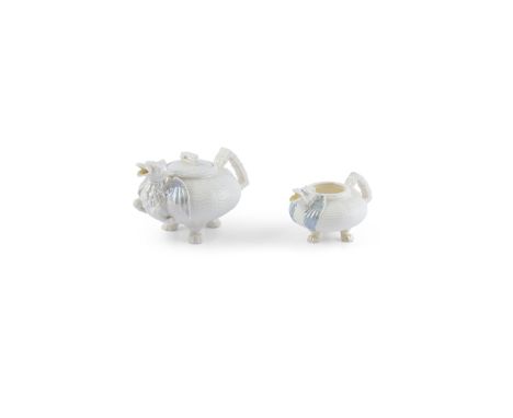 A RARE BELLEEK DRAGON PATTERN TEAPOT AND COVER, first period (1863 - 91), of reduced size, 16.5cm long; together with another