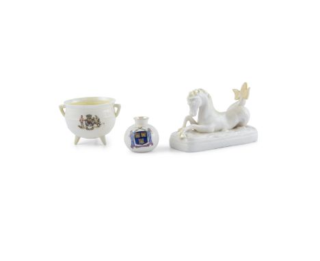 A BELLEEK FIRST PERIOD MODEL OF A SEAHORSE, on a rectangular plinth base, 13cm wide; together with a second period skillet po
