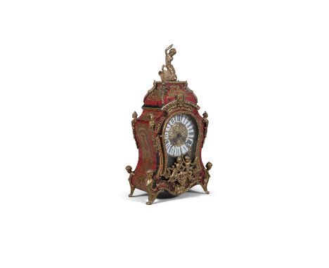 A FRENCH BOULLE MANTLE CLOCK, 19th century, surmounted with classical figure over an arched casing enclosing a segmented enam