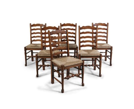 A SET OF SIX OAK LADDER BACK KITCHEN CHAIRS, 19th century, the rectangular backs with five-bar lateral splats, wickered seats