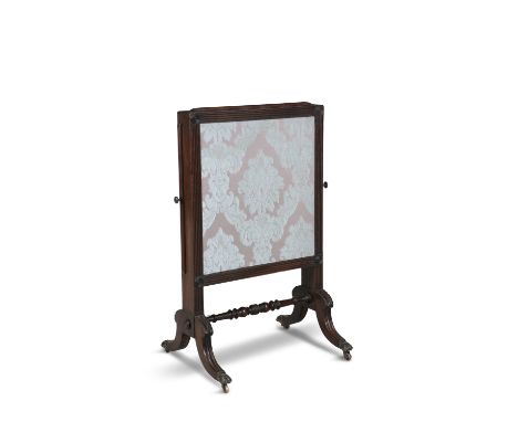 AN IRISH MAHOGANY FRAMED EXTENDING FIRESCREEN, by McWilliams and Gibton, c.1830, the extending rectangular panel filled with 