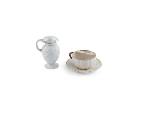 A BELLEEK 'TRELLIS PATTERN' EWER, first period, with pinched spout and rope twist handle; together with a gilt decorated seco