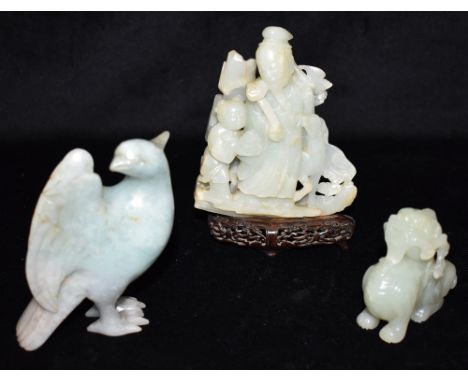 A GROUP OF THREE CHINESE CARVED HARDSTONE CARVINGS, the largest 13.5cm high including (probably associated) stand